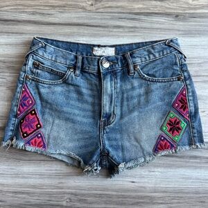 Free People Denim Cutoff Shorts with Pink and Green Embroidery